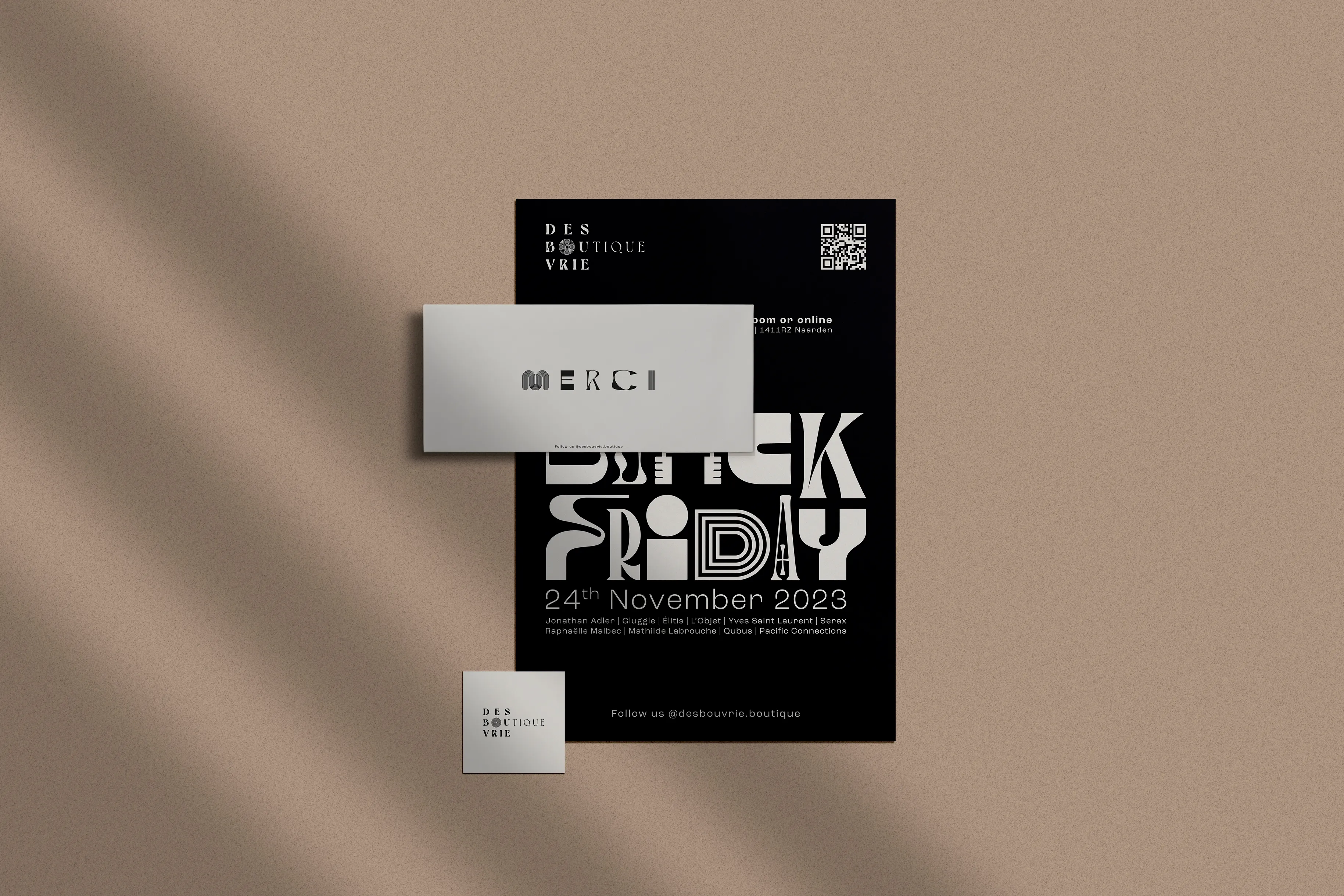 Des Bouvrie Boutique Black Friday poster, Merci card and business card on a taupe background