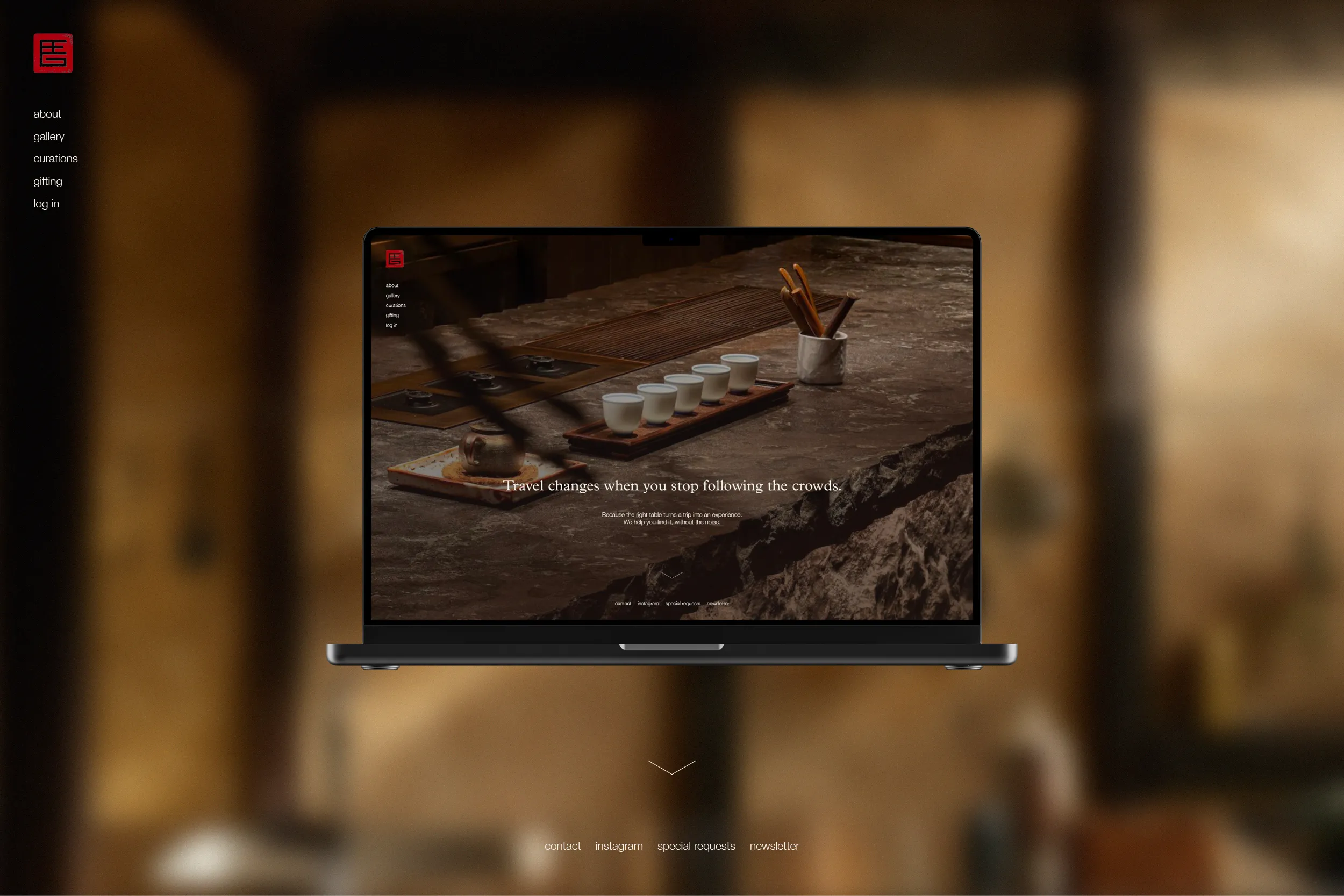 Finest Food Gems website on a laptop, showing a tea service on a stone counter